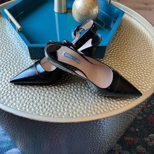 Prada black patent sling back pumps